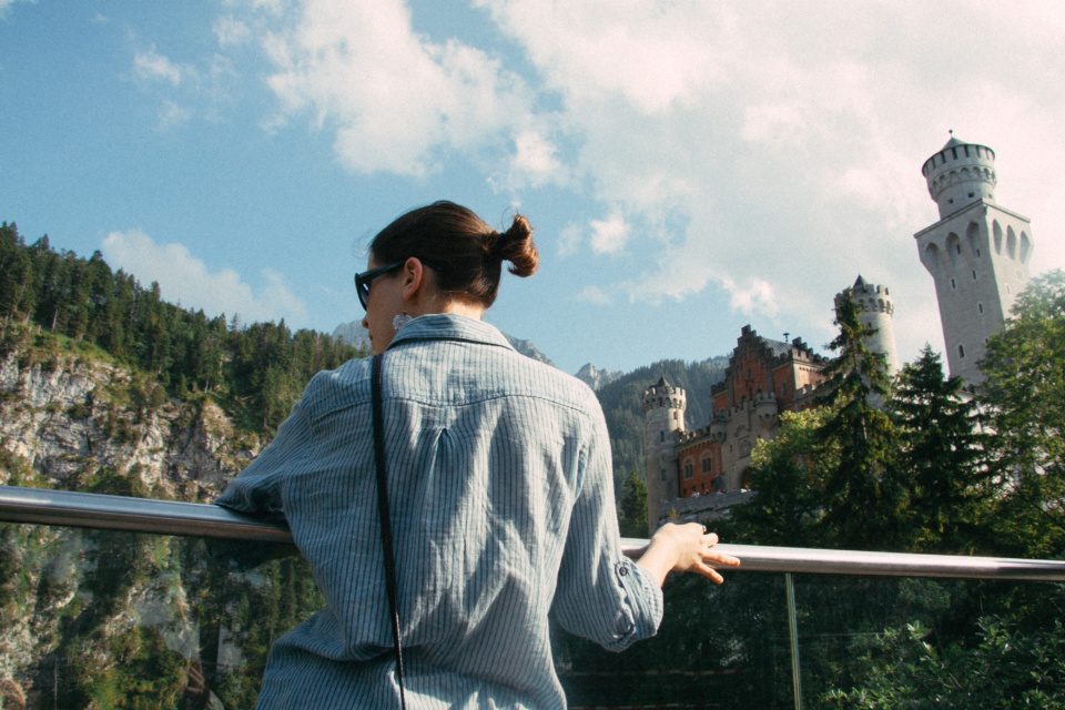Girl near the castle Neuschwanstein
