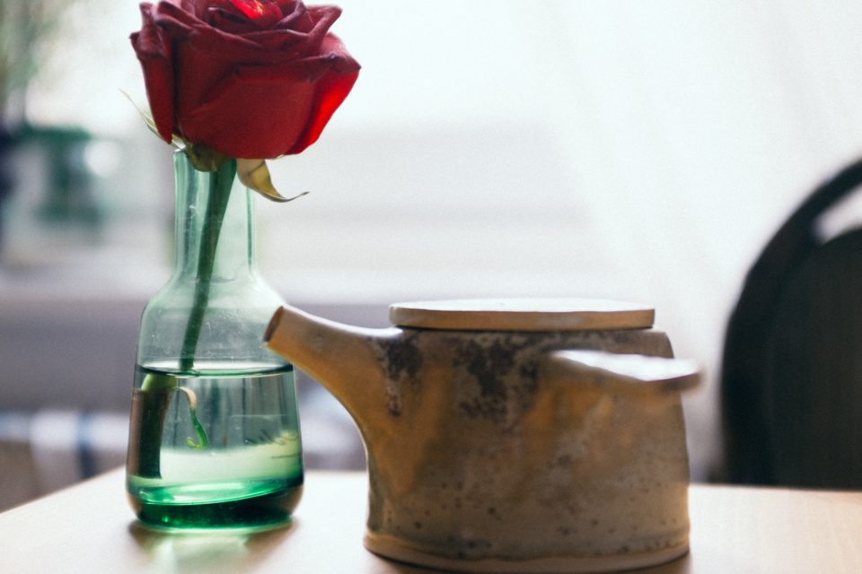 Tiny teapot and rose