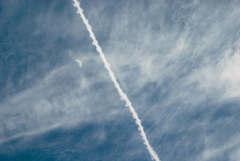 Contrail and the Moon