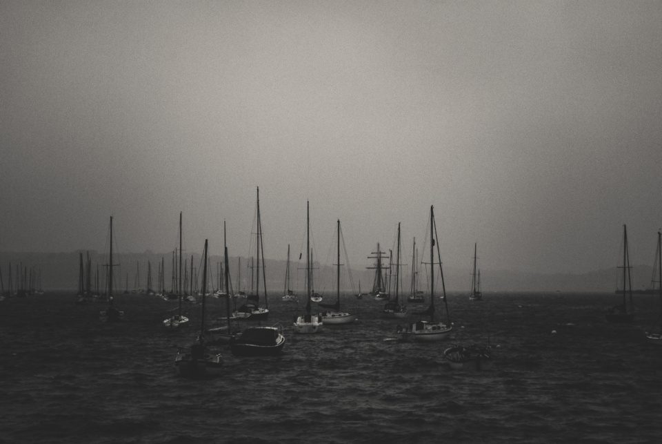 Yachts on river on an overcast day