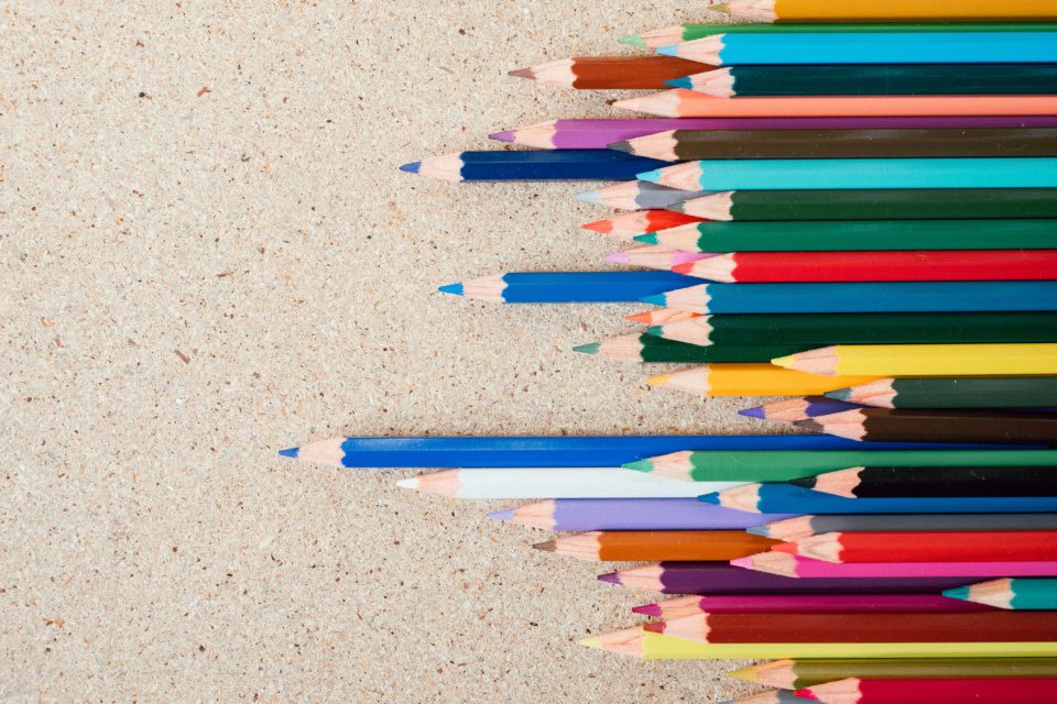 Office Colored Pens for Kids on a Black Background Stock Image