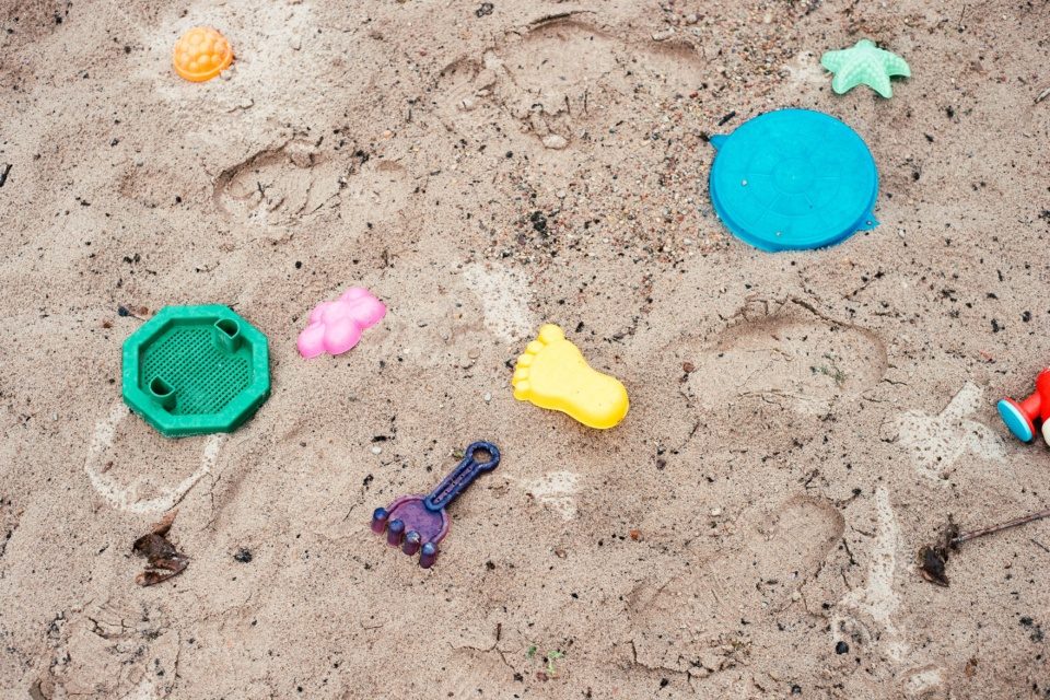 Children toys in sandpit