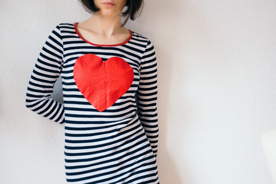 Girl with a heart on a shirt
