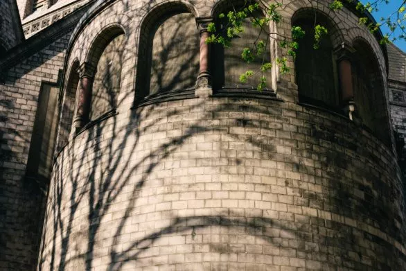 Tree shadow on a brick church