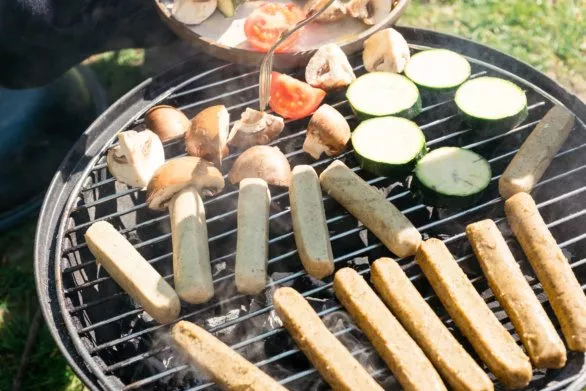 Grilling vegan sausages and veggies
