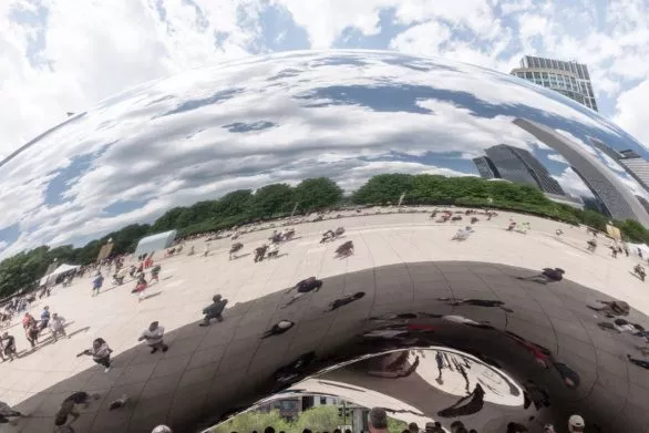 People reflecting on Chicago bean