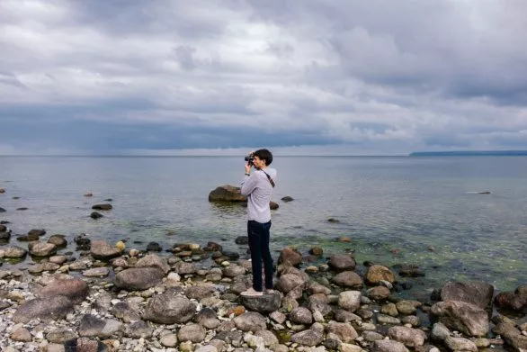 photographer on sea shore