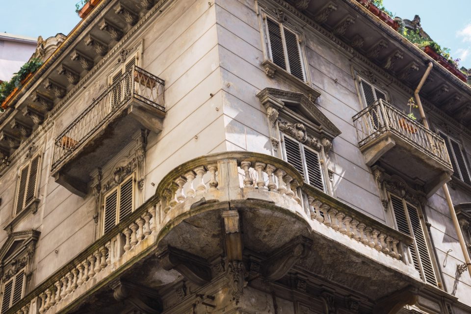 building corner with balcony in turin