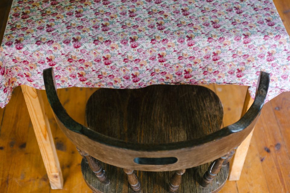 Vintage chair by the table with an oilcloth