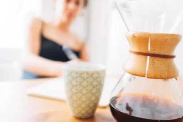 Drinking Chemex coffee and writing in diary