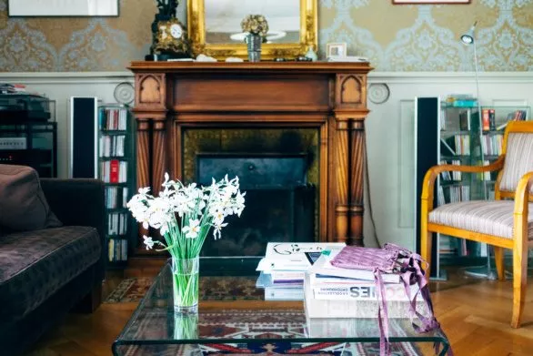 Interior of the living room with flowers on the table