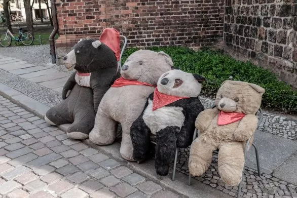 Old teddy bears on the street