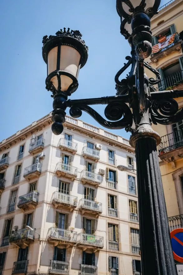 A streetlight and a building in Barcelona