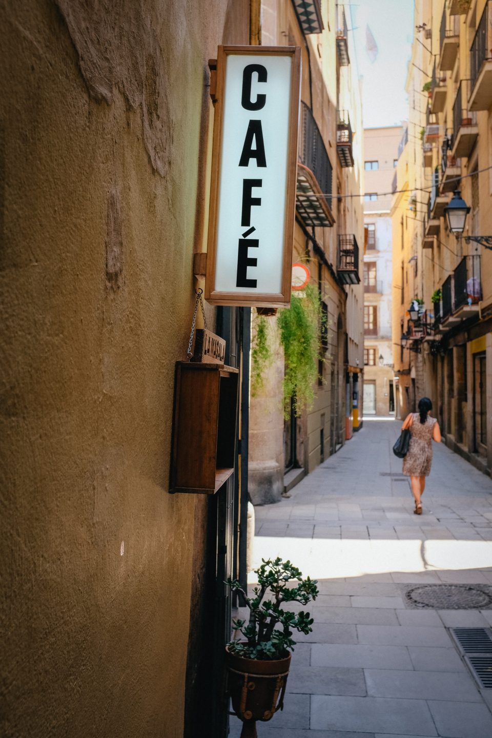 Cafe sign in an old town of Barcelona