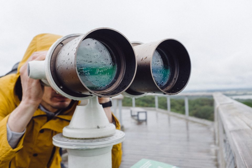Guy with big binoculars