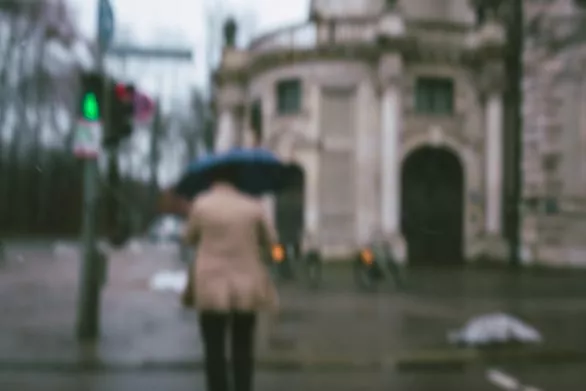 Man with umbrella under the rain