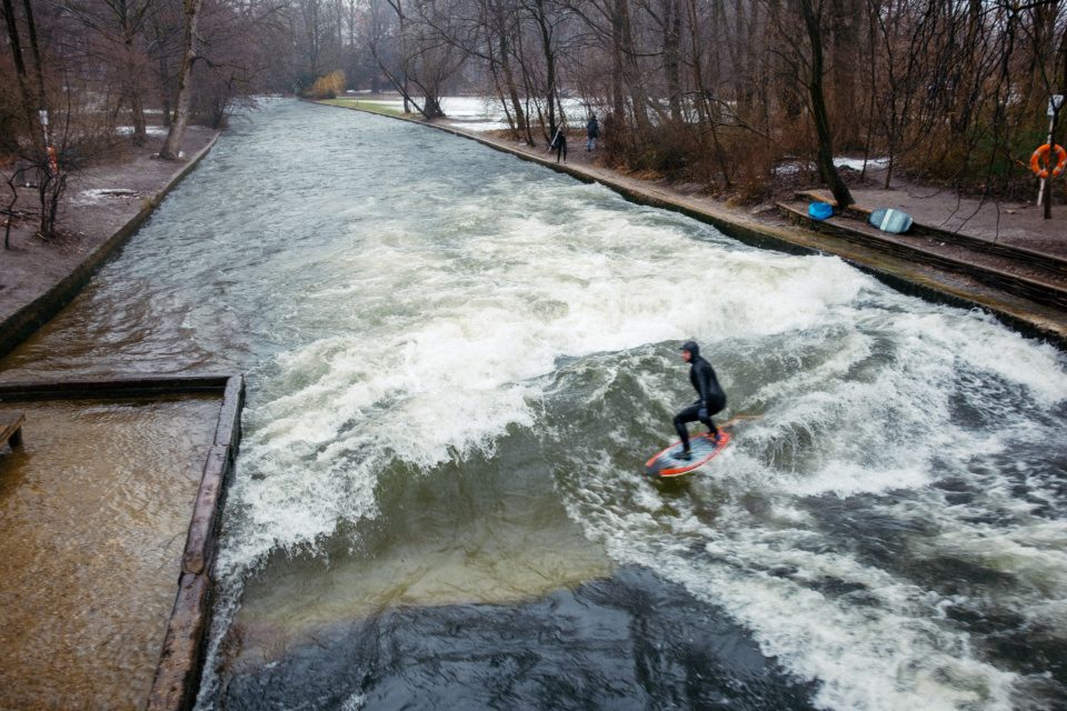 Surfing the Eisbach river in Munich