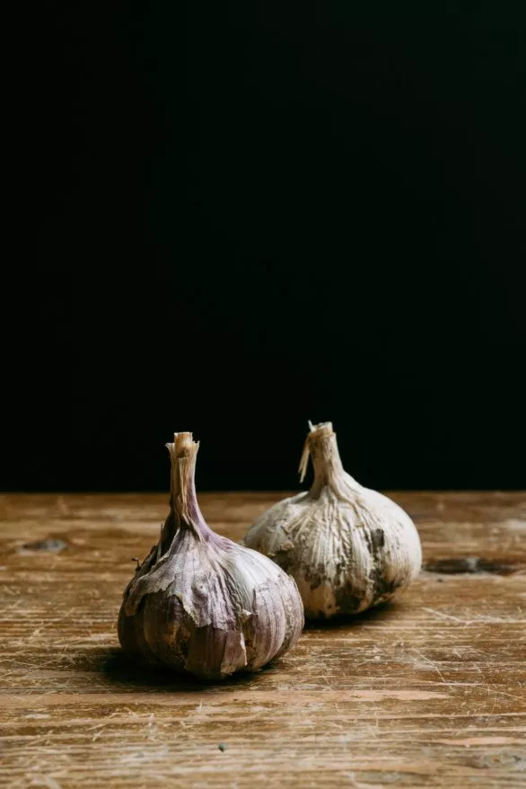 Garlic bulbs on table