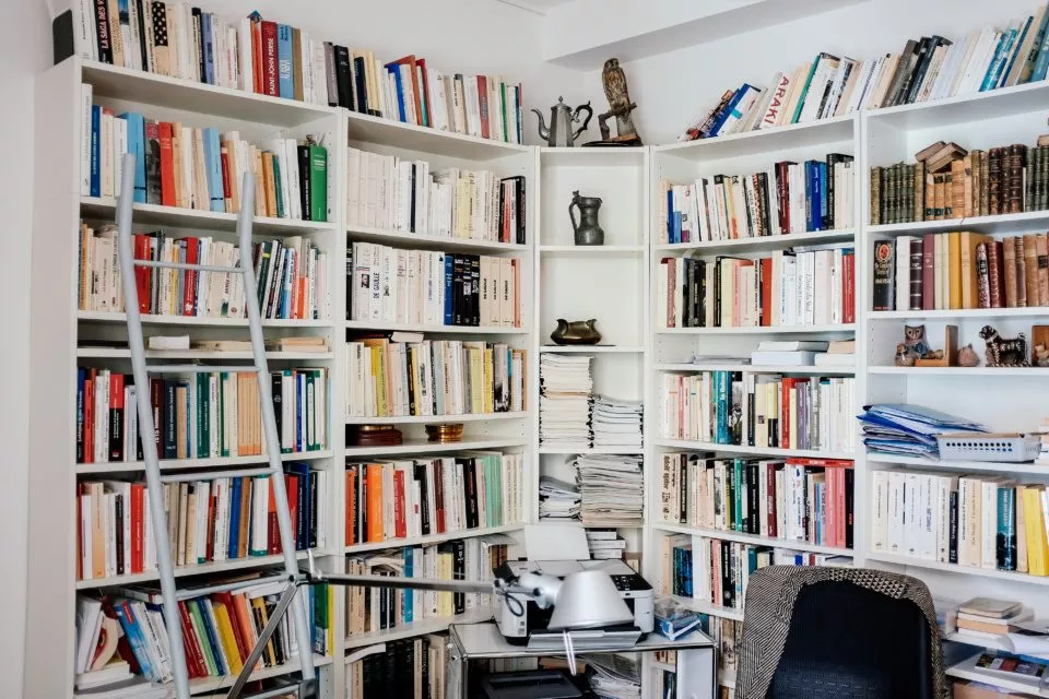 Books and stuff in a home office library