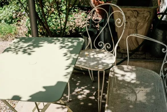 Rusted garden chairs and table