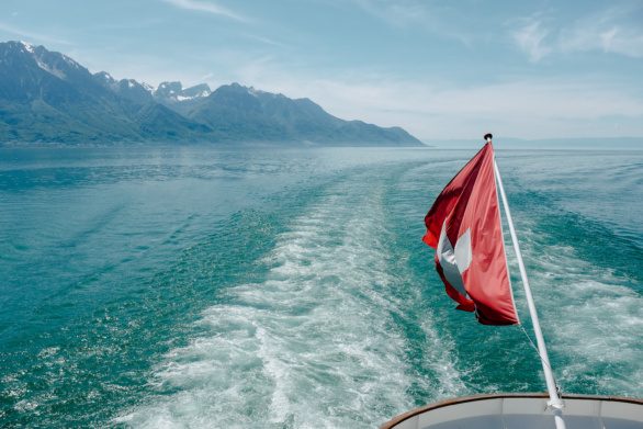 Switzerland Flag on a boat on lake Geneva