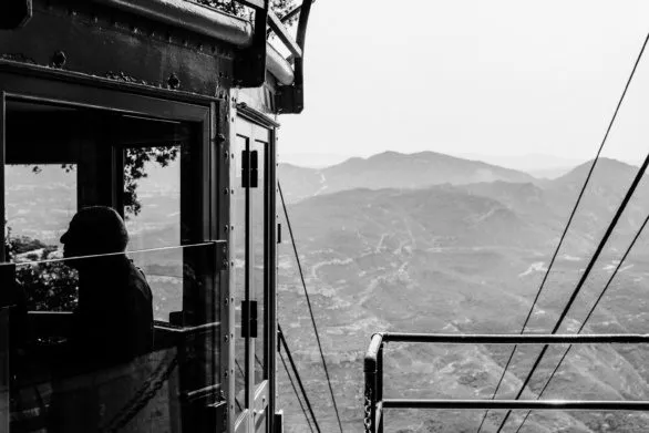 Silhouette of a man in a funicular on Mount Montserrat, Spain