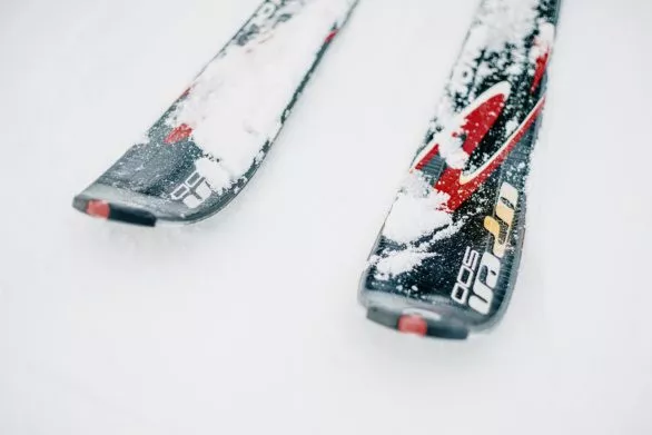 Pair of skis on snow