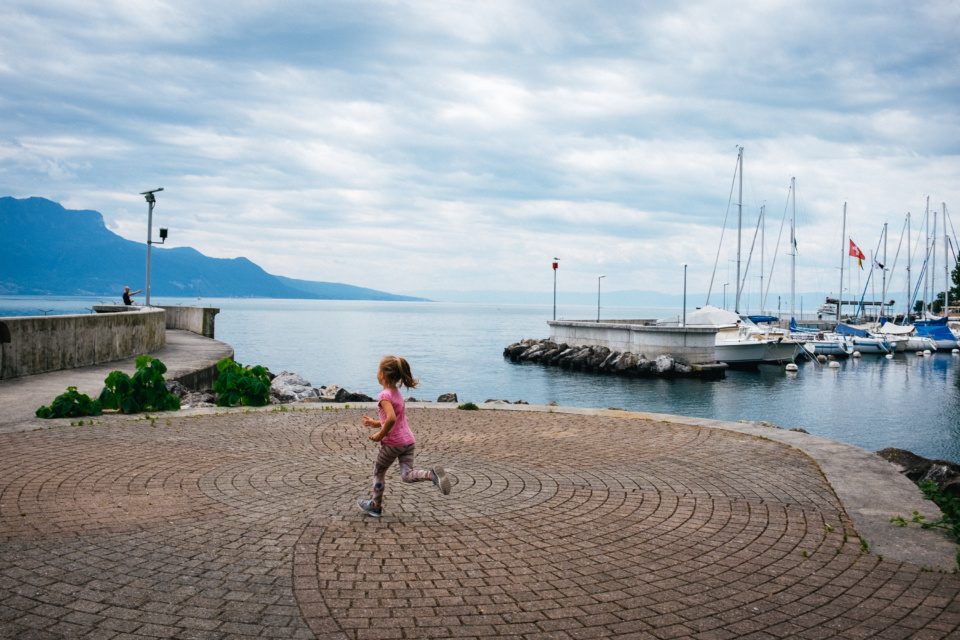 A girl running along the promenade in Vevey, Switzerland