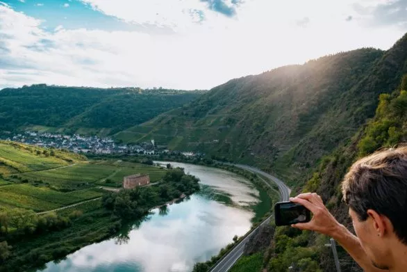 Taking mobile photo of Moselle river