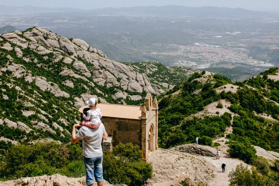 Dad and daughter on a hike in Montserrat, Spain