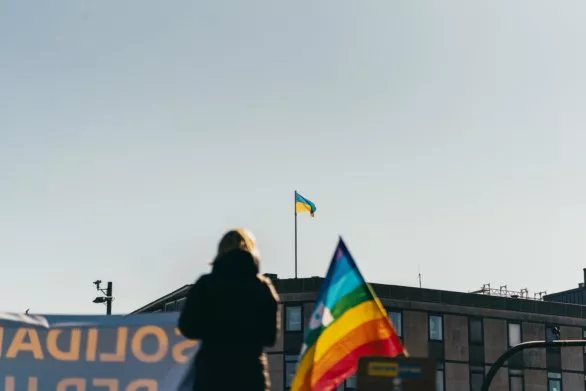 Flags of Ukraine and Peace at an anti-war protest in Hamburg