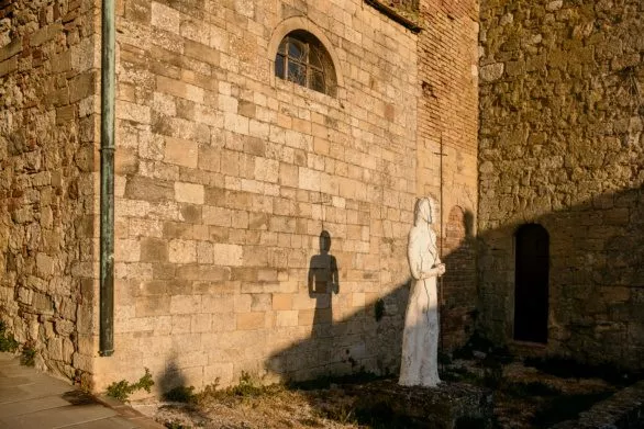 Statue of a saint in the village of Montecastelli Pisano in Ital