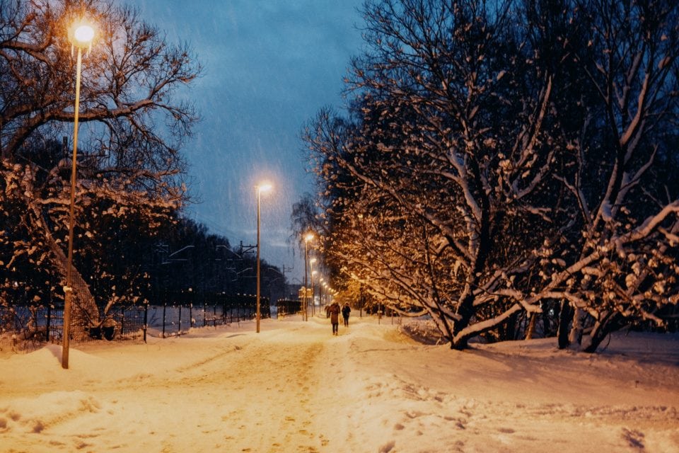 Snowy Evening in Imanta, Riga with Warm Street Lights