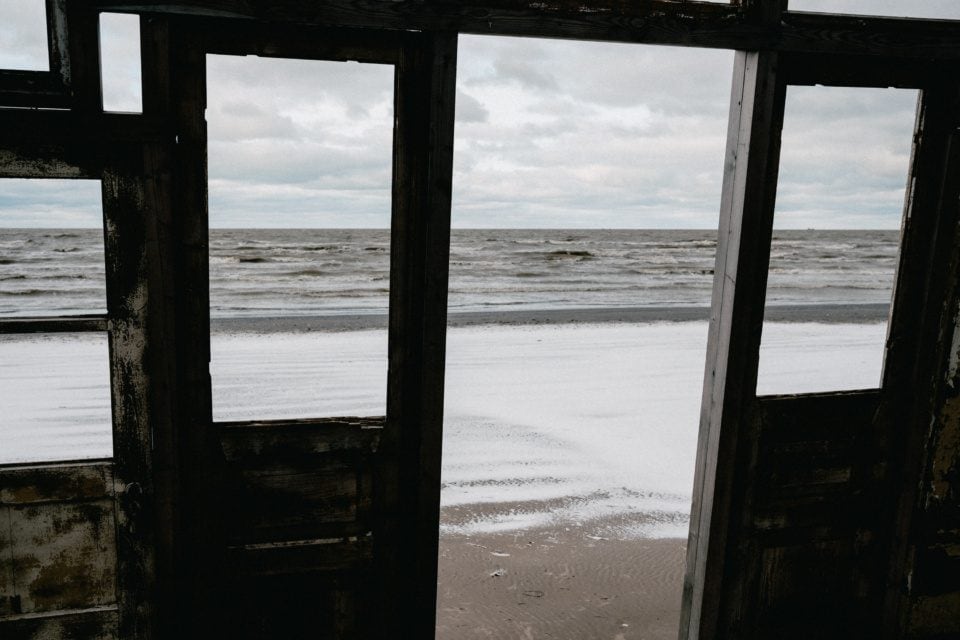 Seascape View through a Rustic Window Frame in Liepaja, Latvia
