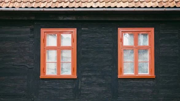 Old timber house with wooden windows