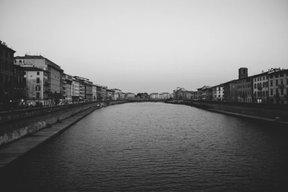 Tranquil Arno River at Dusk in Pisa