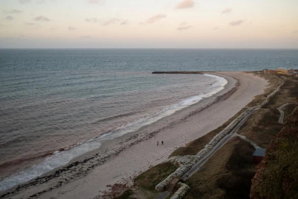 Elevated View of Sandy Beach and Breakwater on Helgoland Island