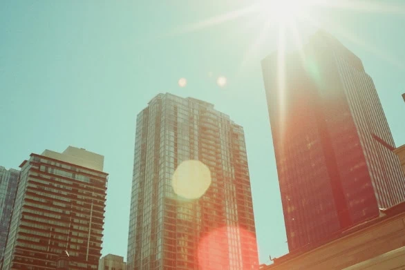 Sunlight Glimmers Off Skyscrapers in Urban Downtown Area