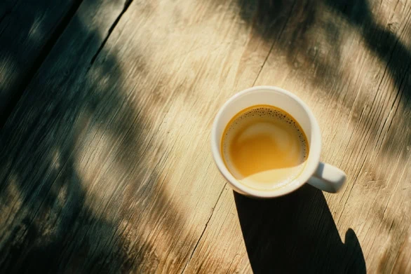 Coffee Cup Resting on Rustic Wooden Table