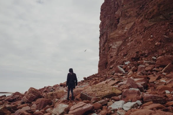 Hiker Exploring Rocky Terrain