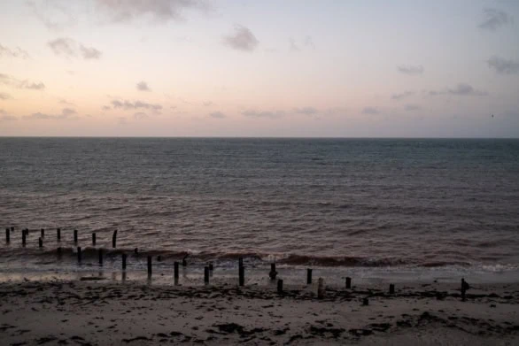 Wooden Pier Remains at Dusk