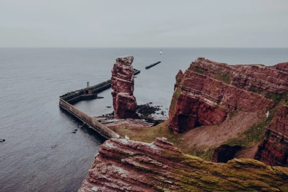 Helgoland's Towering Rock Formations and Pier