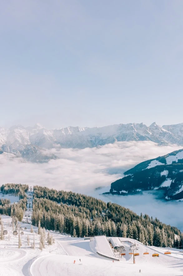 Snow-covered peaks and valley fog in Saalbach-Hinterglemm