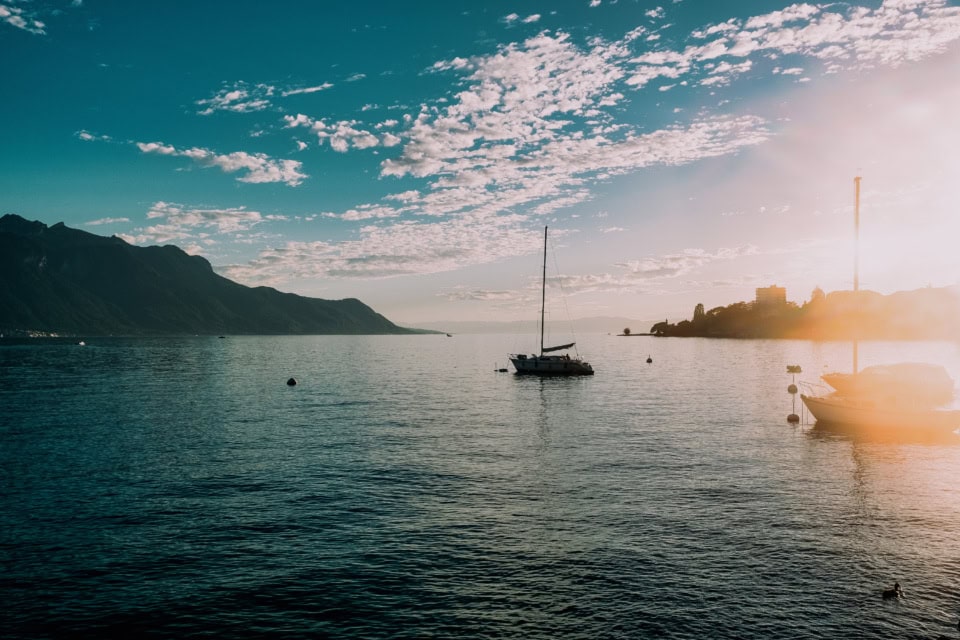 Sailboats on Lake Geneva at Sunset in Montreux, Switzerland