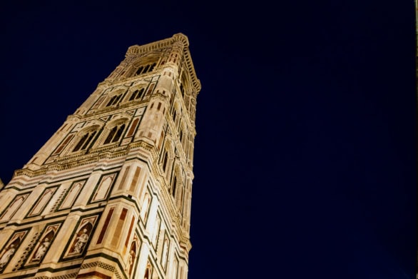 Giotto’s Campanile illuminated at night in Florence, Italy